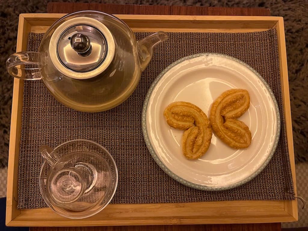 Enjoy butterfly cookie and ginger tea after your massage