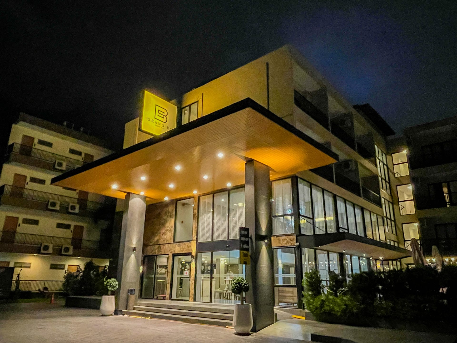 Nightly View of Grand BS Airport Hotel entrance